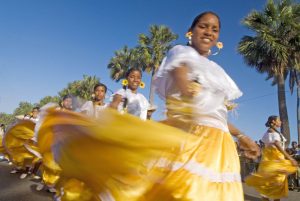 Dancers shake it up to punta rock music.