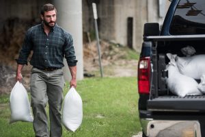 Jordan Miller carries sandbags to his truck during preparations for the expected arrival of Hurricane Matthew in Charleston, South Carolina, USA, 06 October 2016. Hurricane Matthew has crossed over parts of Haiti and Cuba and is expected to move up the east coast of the United States. EPA/SEAN RAYFORD