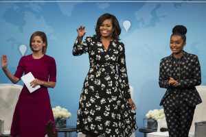 Cindy Leive (L), Editor in Chief of Glamour magazine, US First Lady Michelle Obama (C), and actress Yara Shahid (R) participate in a real-time, digital conversation using Skype with adolescent girls around the world titled 'A Brighter Future: A Global Conversation on Girls' Education' at the Newseum in Washington, DC USA, 11 October 2016. Glamour magazine hosted the event in celebration of International Day of the Girl and the Let Girls Learn initiative. EPA/JIM LO SCALZO