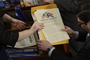 Clerks open envelopes and take out certificates of electoral votes during a joint session of the 113th Congress to count the 2012 Presidential electoral votes, in the House Chamber on Capitol Hill in Washington DC, USA, 04 January 2013. The ballots from the electoral college have been sealed until the vote, which confirms the election of President Barack Obama and Vice President Joe Biden. EPA/MICHAEL REYNOLDS